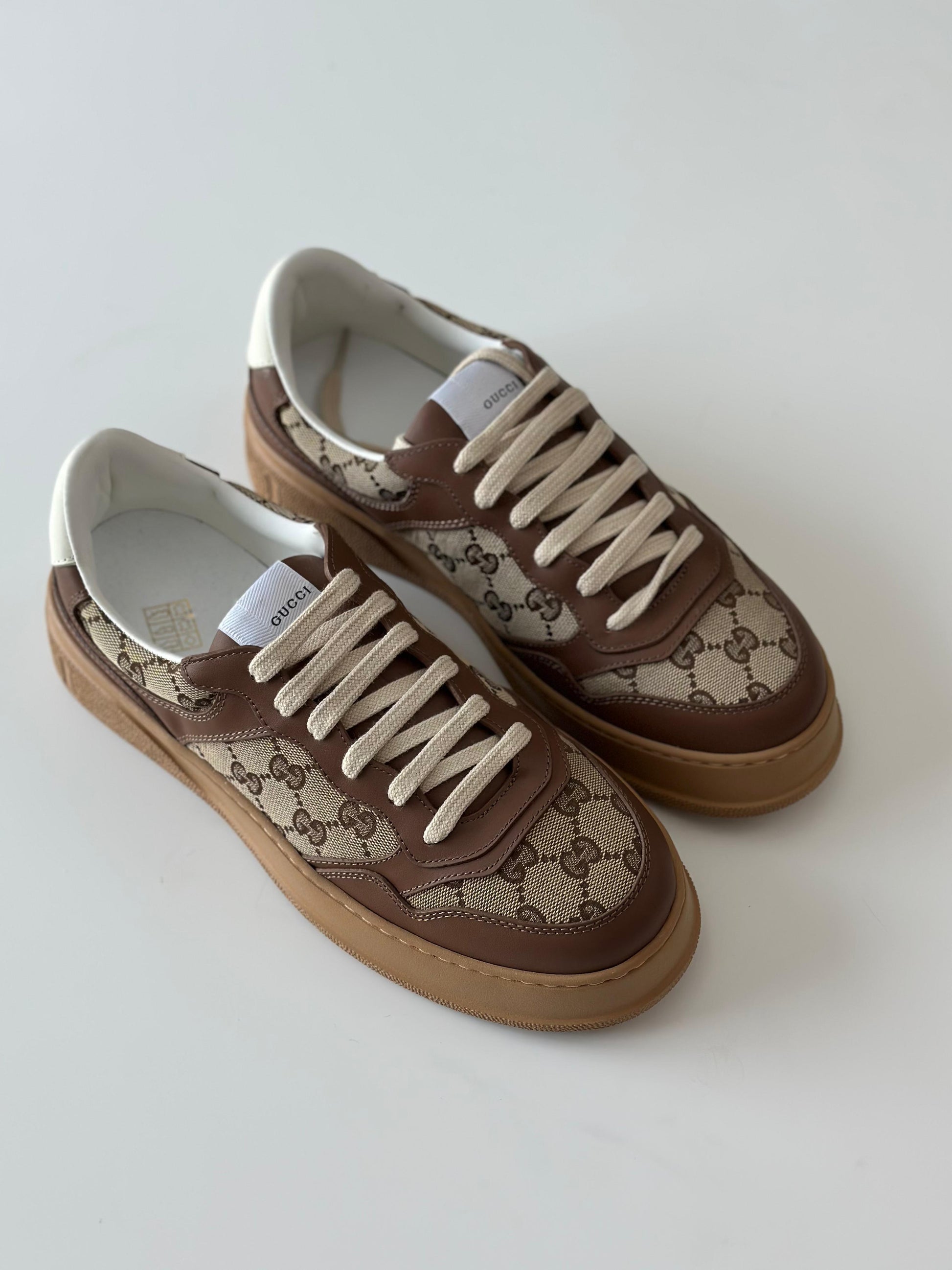 Gucci Women’s GG Canvas Leather-Trimmed Sneakers – Brown (Mytheresa)