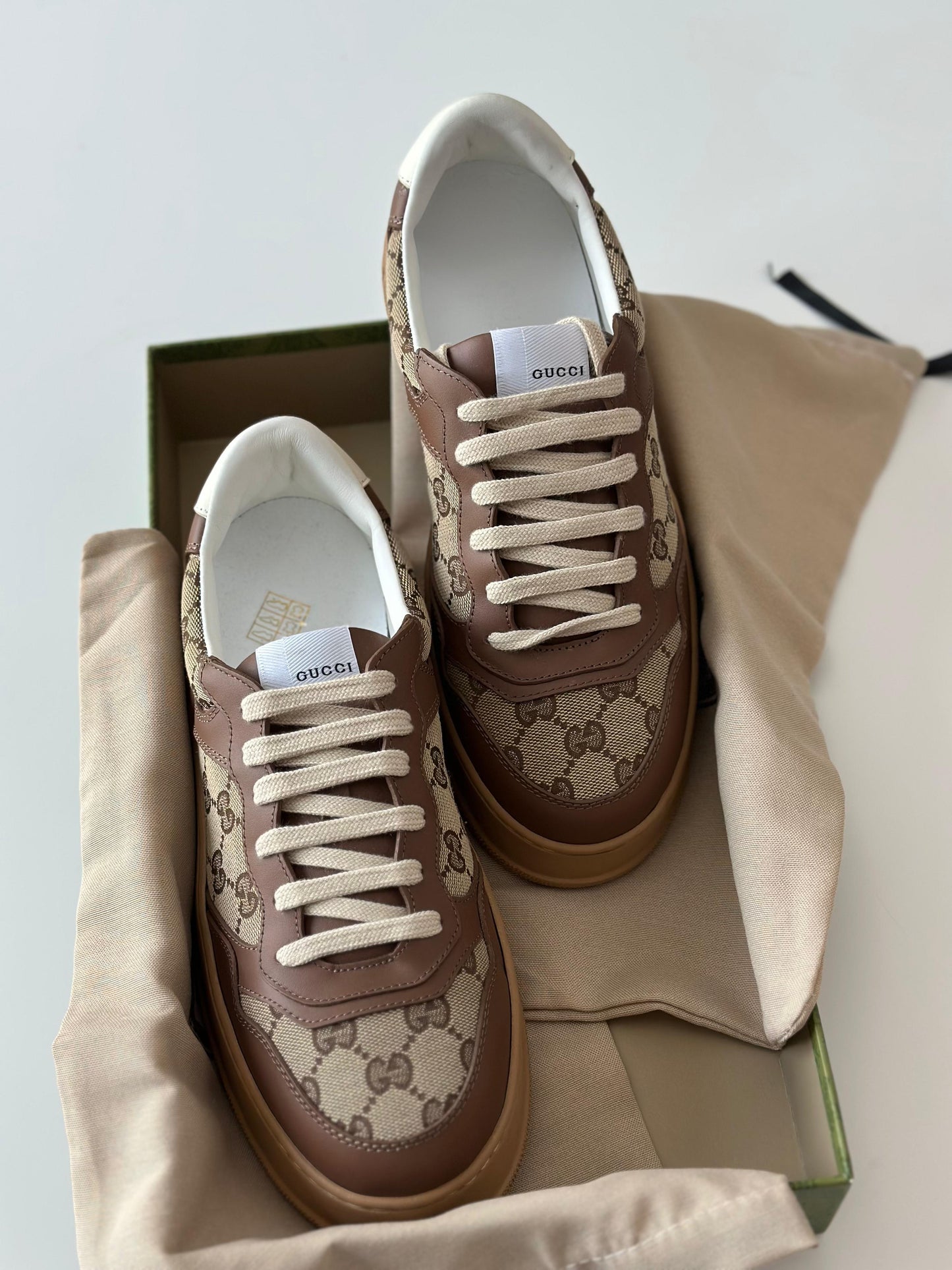 Gucci Women’s GG Canvas Leather-Trimmed Sneakers – Brown (Mytheresa)