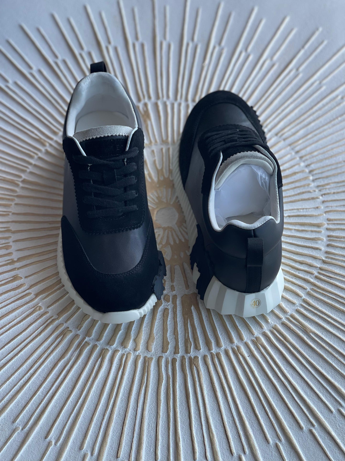 Hermès Bouncing Sneaker – Black Leather & Suede Low-Top with Oversized H Motif