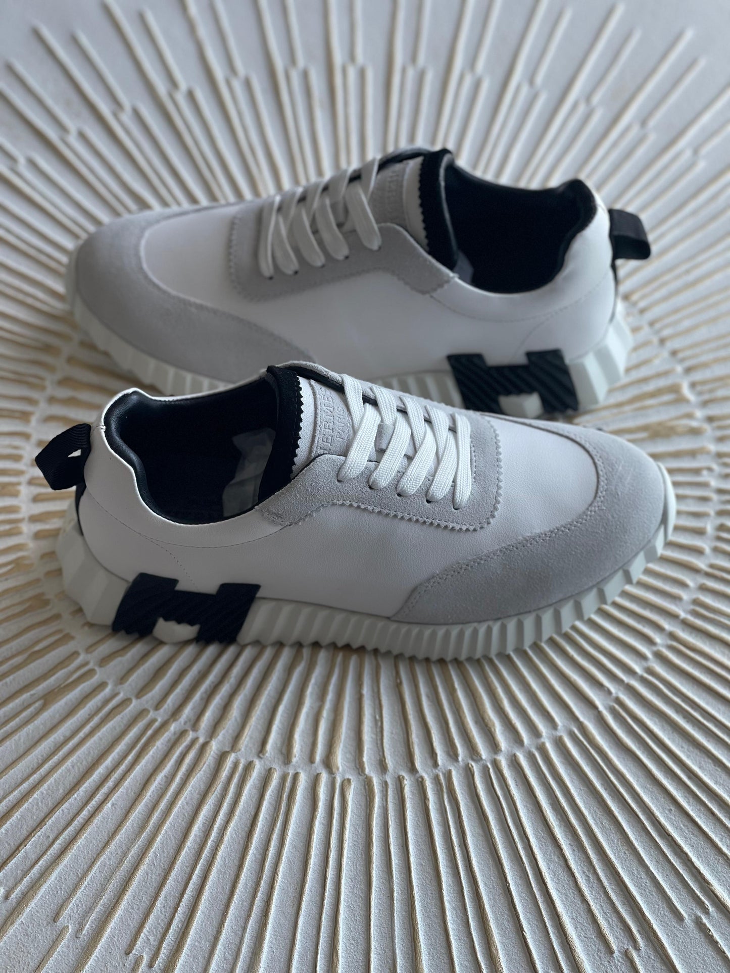 Hermès Leather Logo Sneakers – White Calfskin Low-Top