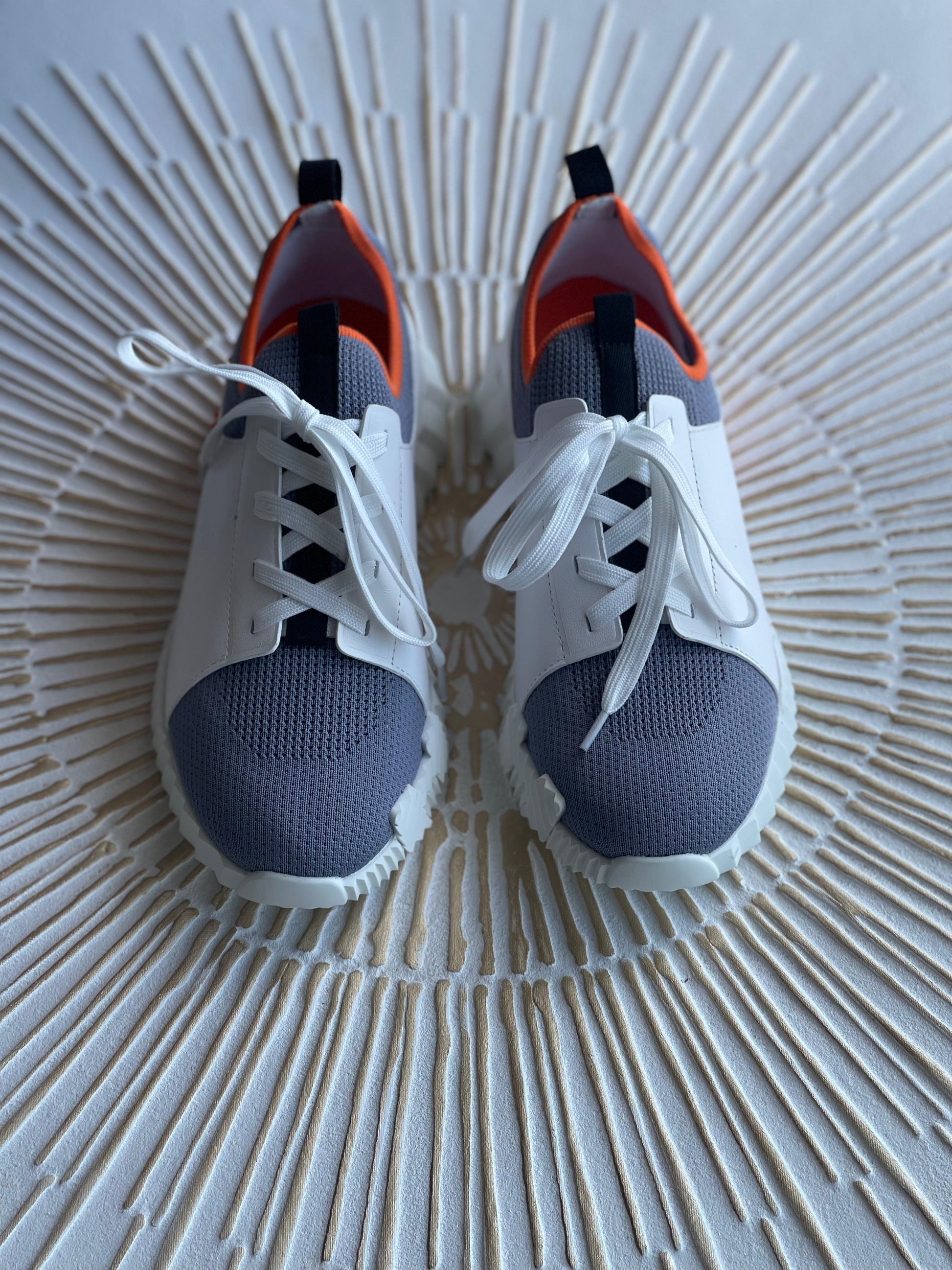 Hermès Depart Slip-On Sneaker – Knit & Calfskin Minimalist Design with Signature Orange Edge