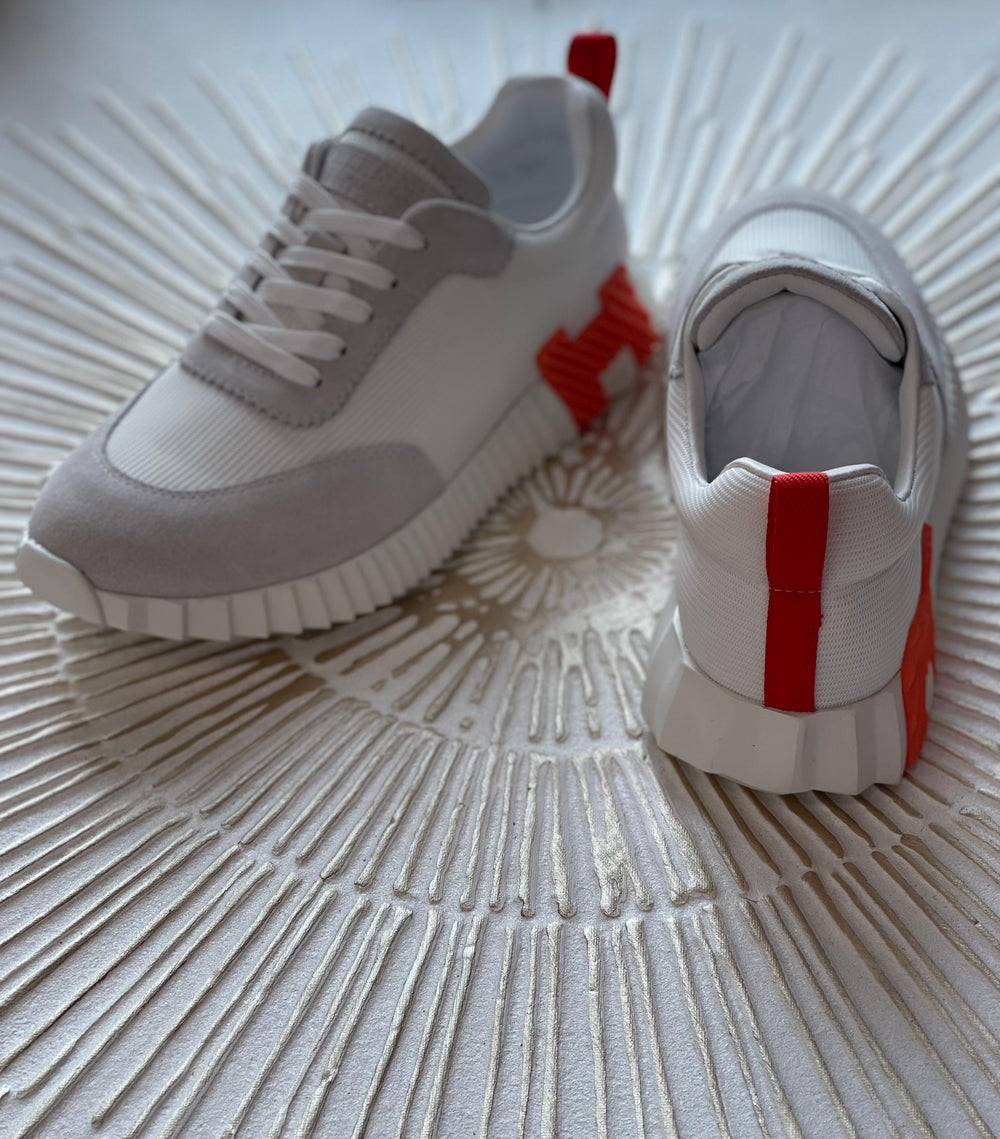 Hermès Bouncing Sneaker in White Calfskin & Suede – Lightweight Urban Elegance.