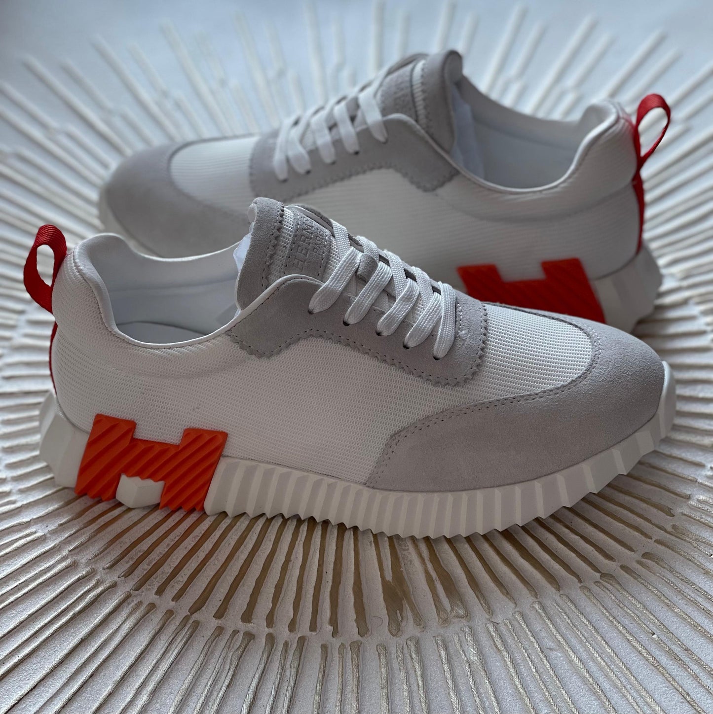 Hermès Bouncing Sneaker in White Calfskin & Suede – Lightweight Urban Elegance.