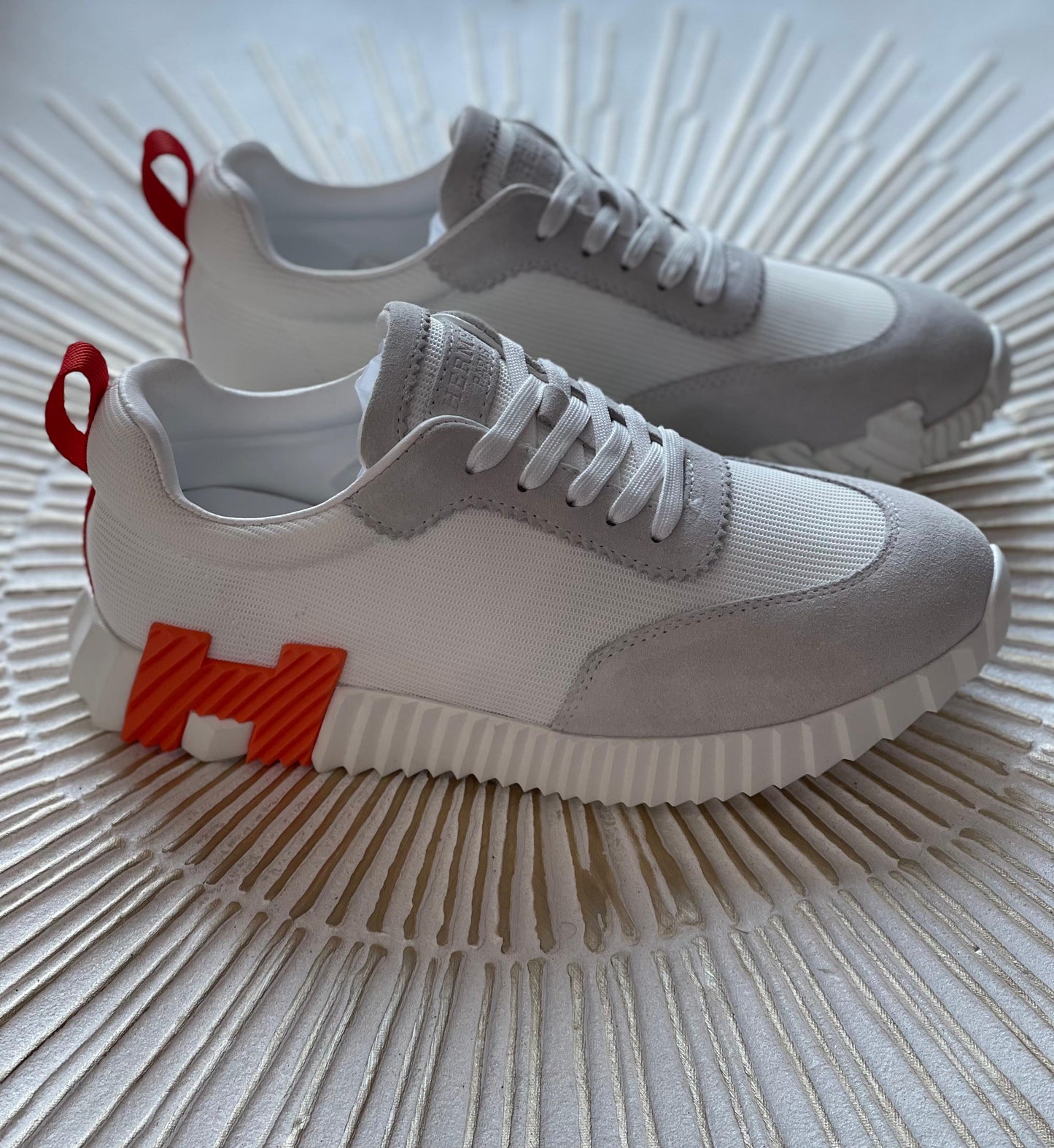 Hermès Bouncing Sneaker in White Calfskin & Suede – Lightweight Urban Elegance.