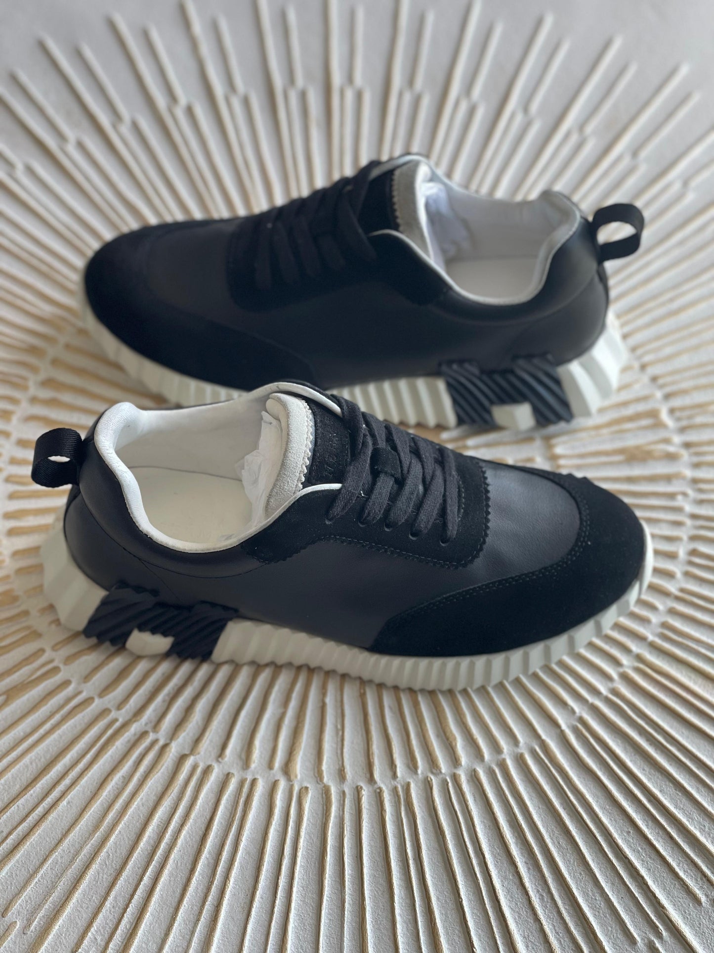 Hermès Bouncing Sneaker – Black Leather & Suede Low-Top with Oversized H Motif